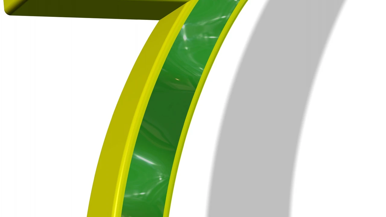 Two mint chocolate milkshakes with whipped cream and green sprinkles.