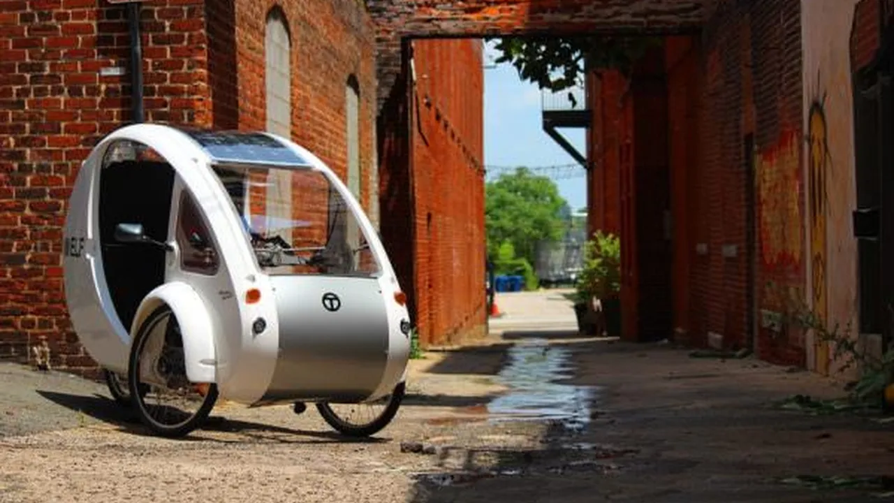 Close up on a plate of mashed potatoes, topped with baked pork chops with cream of mushroom soup, and a side of green beans.