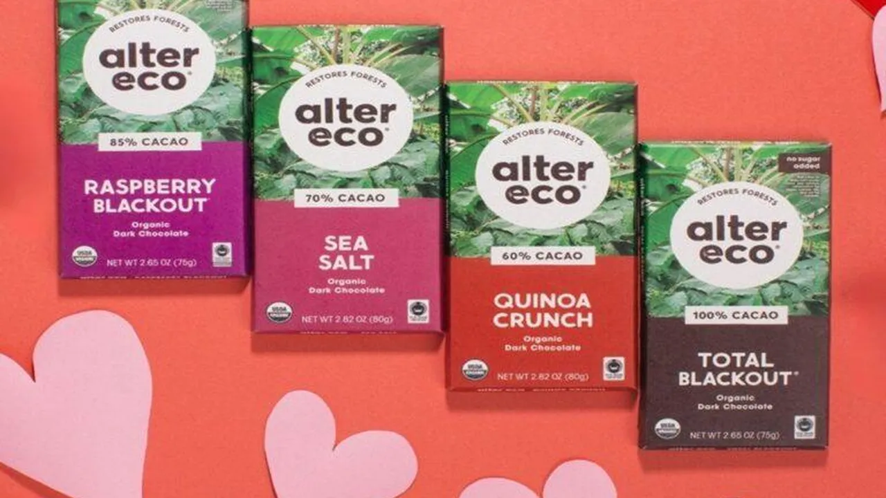 Close up on a plate of mashed potatoes, topped with baked pork chops with cream of mushroom soup, and a side of green beans.