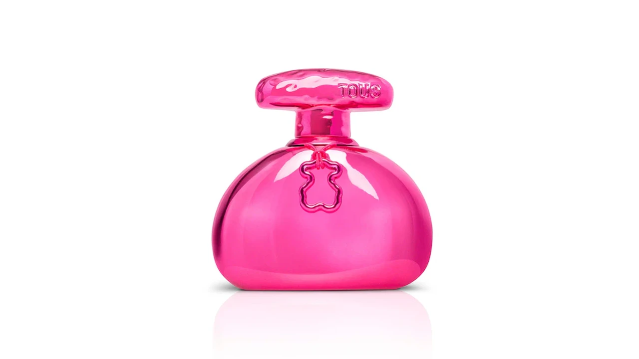 Close up on a plate of mashed potatoes, topped with baked pork chops with cream of mushroom soup, and a side of green beans.