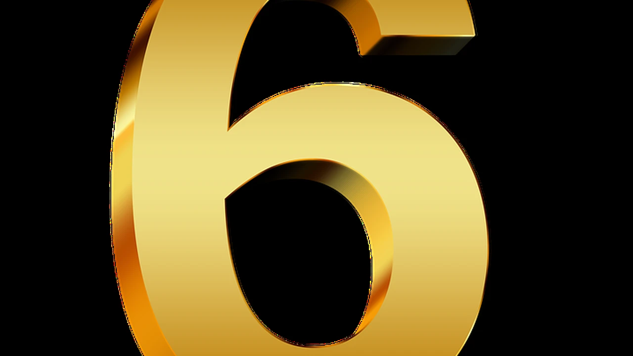 Close up on a plate of mashed potatoes, topped with baked pork chops with cream of mushroom soup, and a side of green beans.