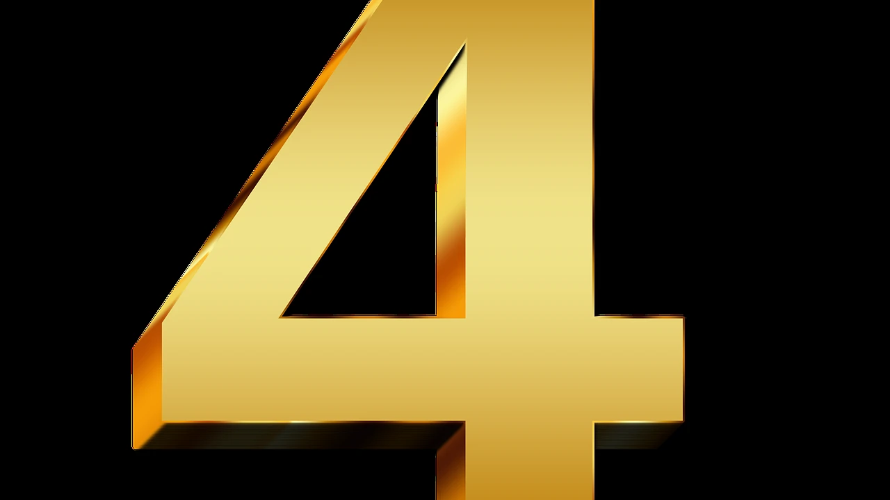 Close up on a plate of mashed potatoes, topped with baked pork chops with cream of mushroom soup, and a side of green beans.