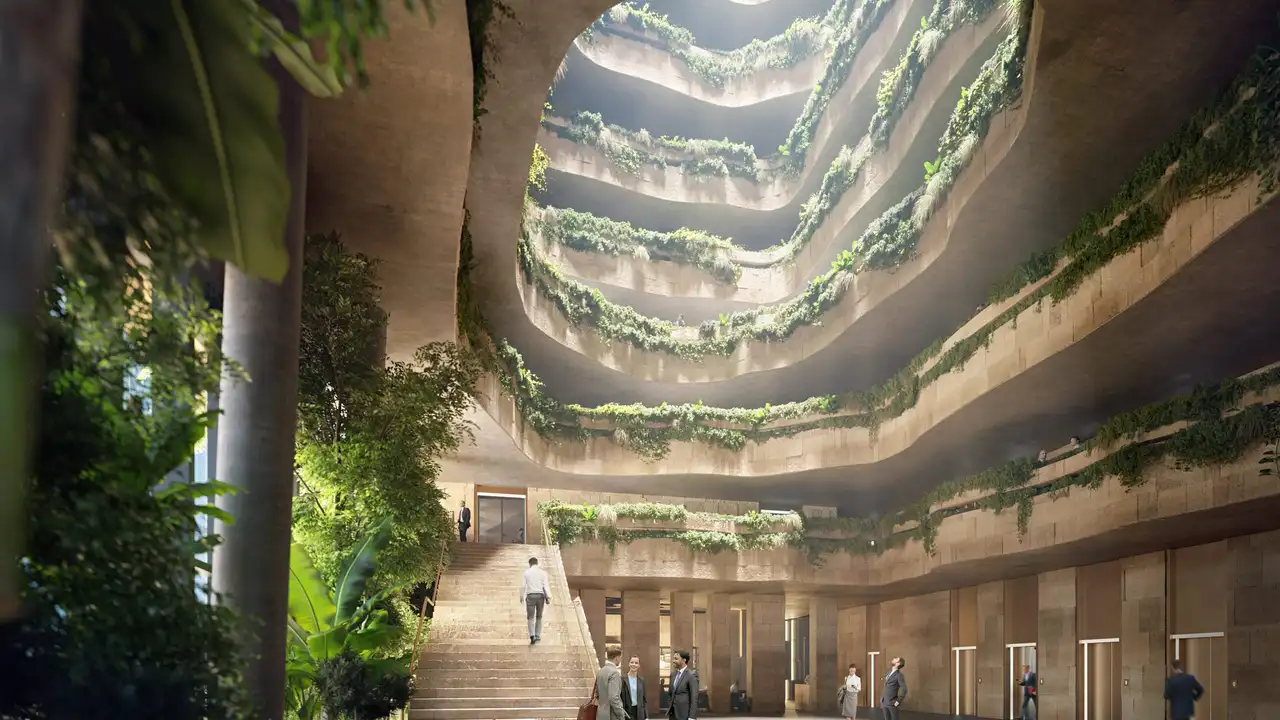 Close up on a plate of mashed potatoes, topped with baked pork chops with cream of mushroom soup, and a side of green beans.